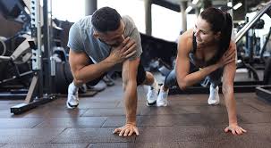 Toning Bingo Wings: Your Ultimate Guide to Sculpting Sleek Arms at the Gym 3 Fitness trainer demonstrating arm toning exercises Wisley